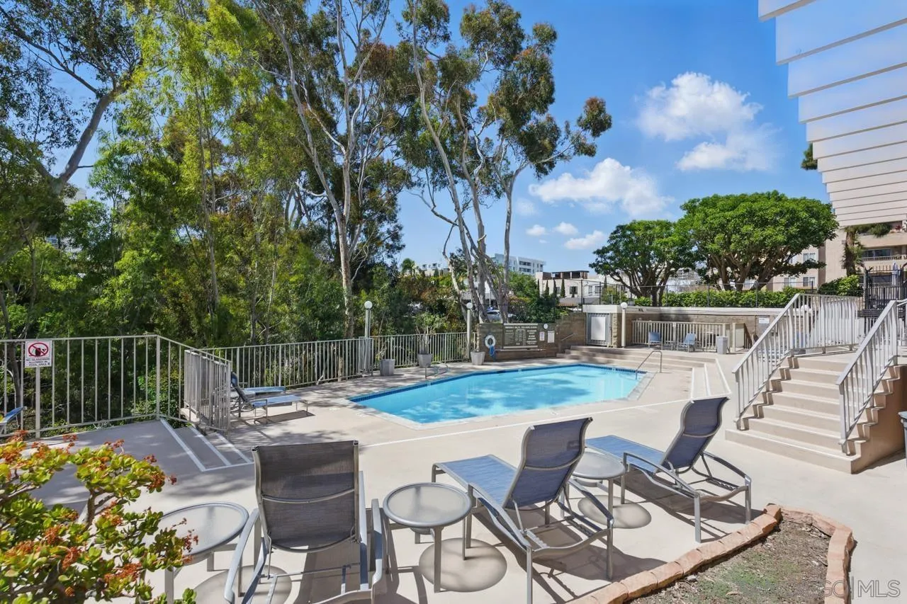 3635 7th Avenue, Unit 2D San Diego, CA 92103 - Photo 60 of 68 a view of a patio with couches table and chairs and potted plants