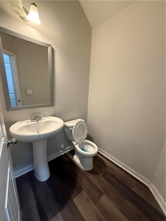 4299 Traipse Path Ellenwood, GA 30294 - Photo 6 of 12 a bathroom with a sink toilet and a mirror