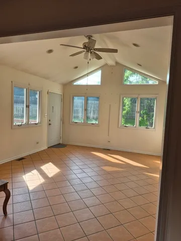 a view of an empty room and window
