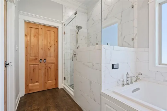a bathroom with a sink and shower