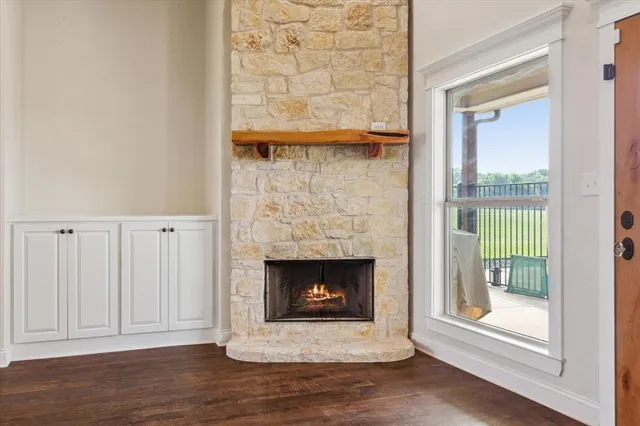 a living room with a fireplace