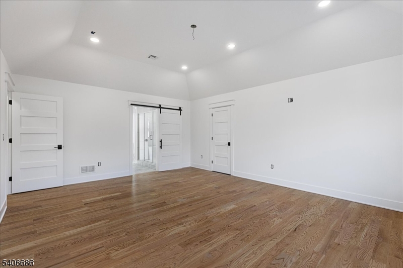 759 Mechlin Corner Road Hampton, NJ 08827 - Photo 28 of 49 a view of an empty room with wooden floor