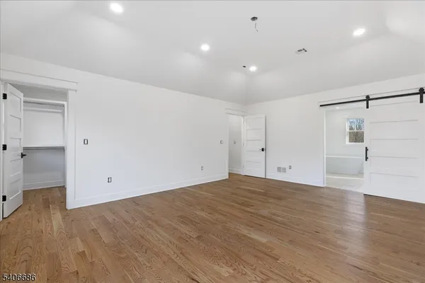 a bathroom with a shower and toilet
