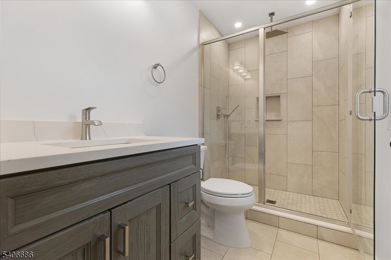 759 Mechlin Corner Road Hampton, NJ 08827 - Photo 34 of 49 a bathroom with a sink a toilet and shower