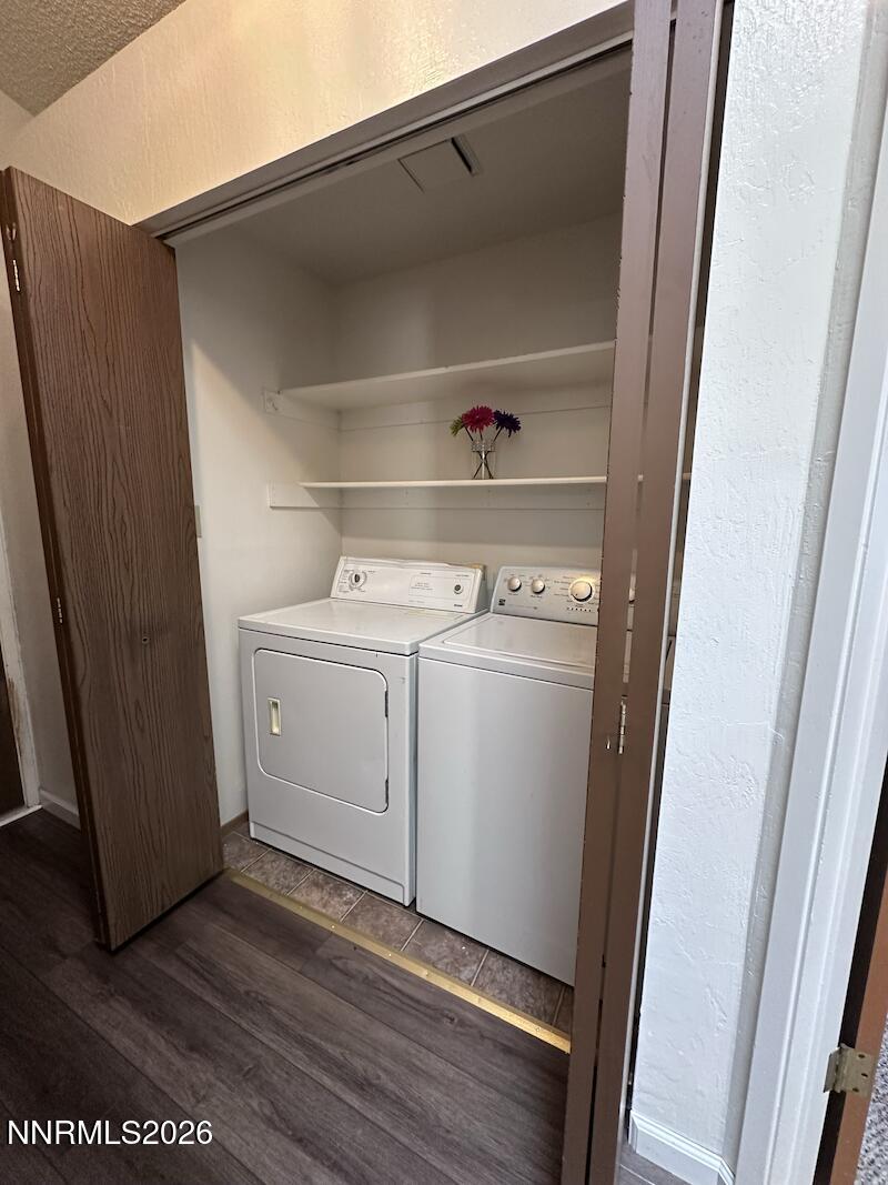 1182 Blue Lakes Road Reno, NV 89523 - Photo 20 of 31 a utility room with wooden floor washer and dryer