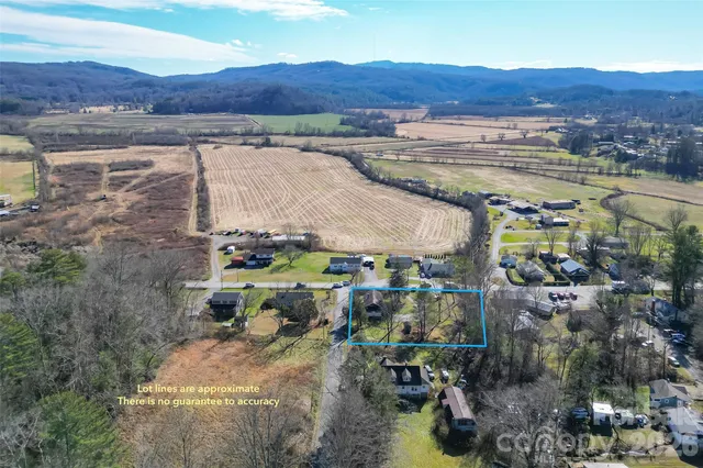 a view of a city with mountains in the background