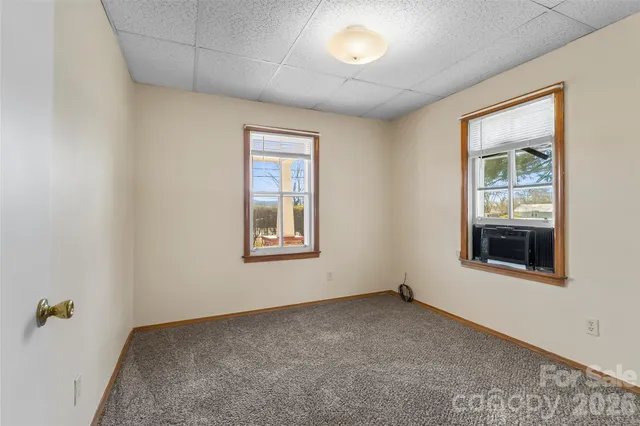 an empty room with windows