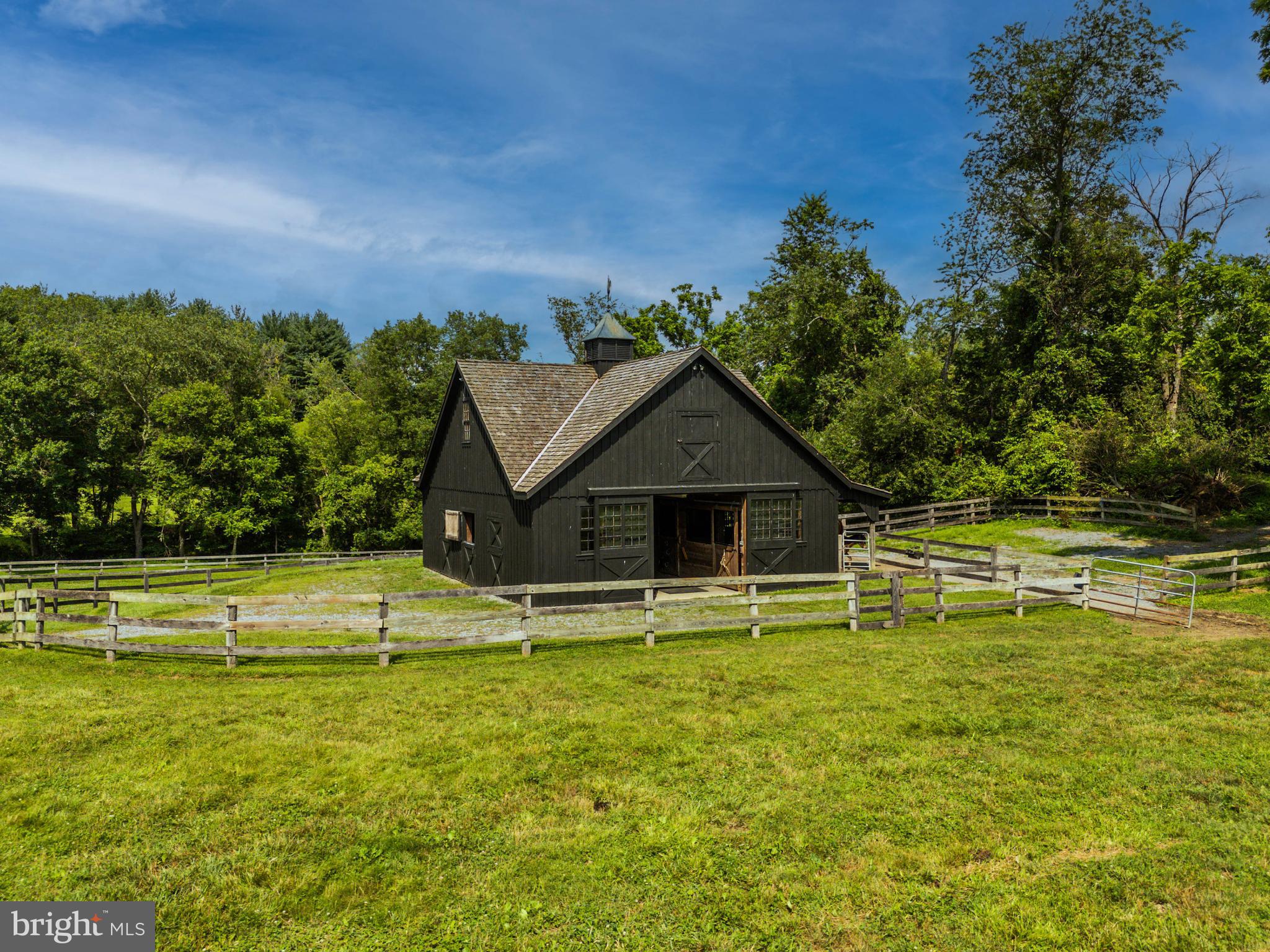3223 Mt Zion Road Upperco, MD 21155 - Photo 14 of 65 a front view of a house with a yard