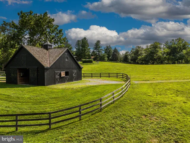 a view of a house with a big yard