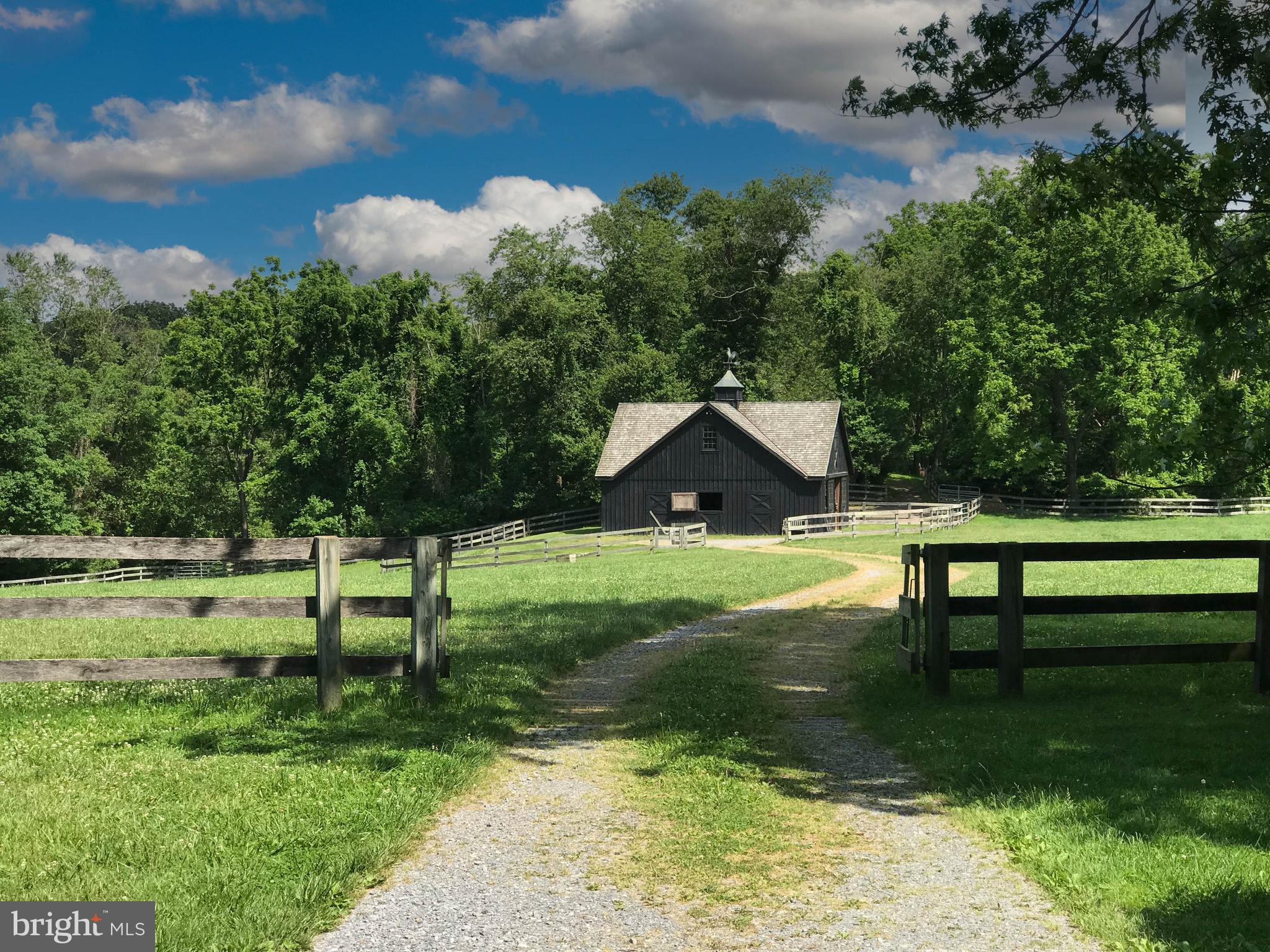 3223 Mt Zion Road Upperco, MD 21155 - Photo 22 of 65 a view of a bench in a garden