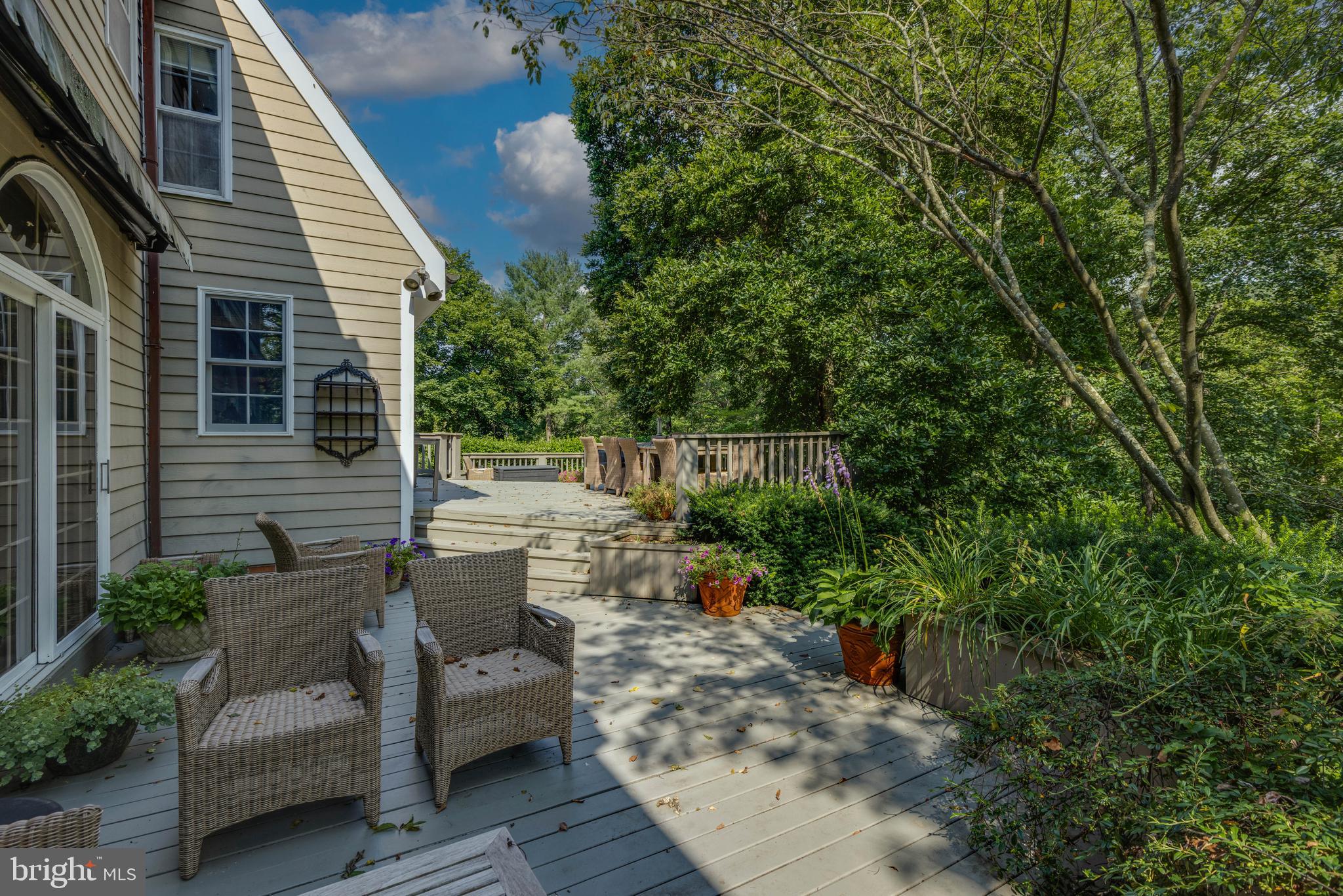 3223 Mt Zion Road Upperco, MD 21155 - Photo 34 of 65 a view of a patio with couches and potted plants