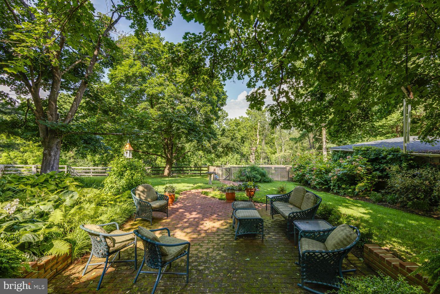 3223 Mt Zion Road Upperco, MD 21155 - Photo 39 of 65 a view of a lake with couches and table