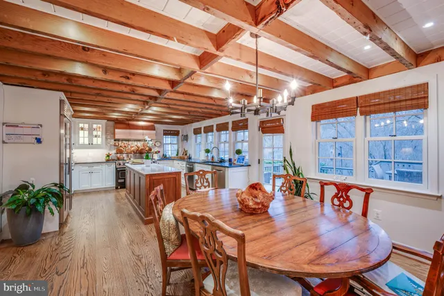 a bathroom with a double vanity sink a bathtub and shower