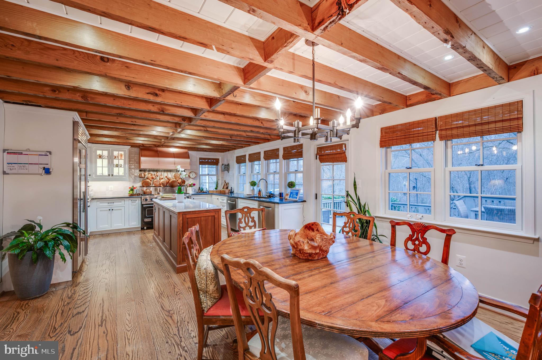 3223 Mt Zion Road Upperco, MD 21155 - Photo 43 of 65 a outdoor dining space with furniture and wooden floor