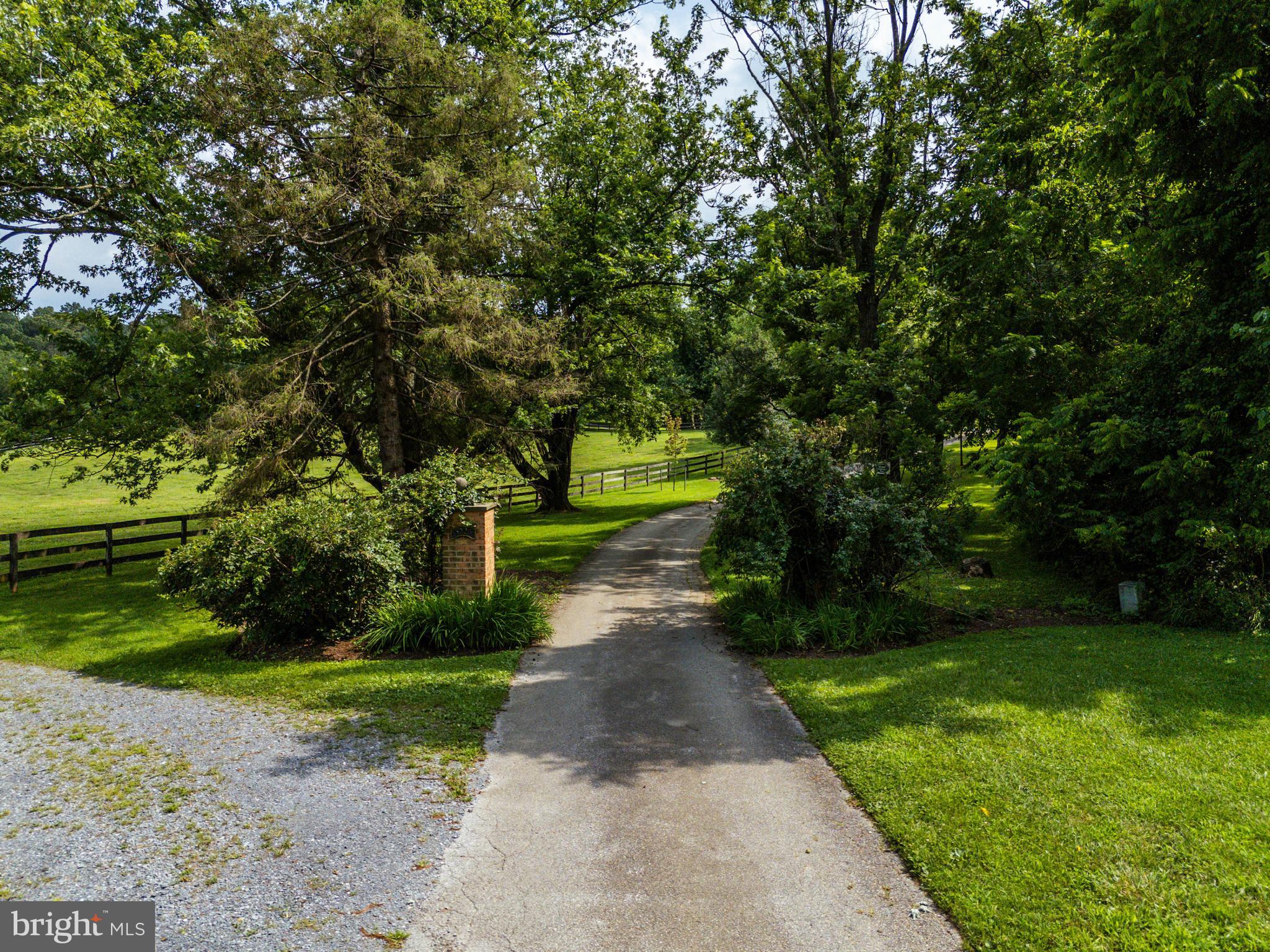 3223 Mt Zion Road Upperco, MD 21155 - Photo 48 of 65 a view of street with with lots of green space and trees