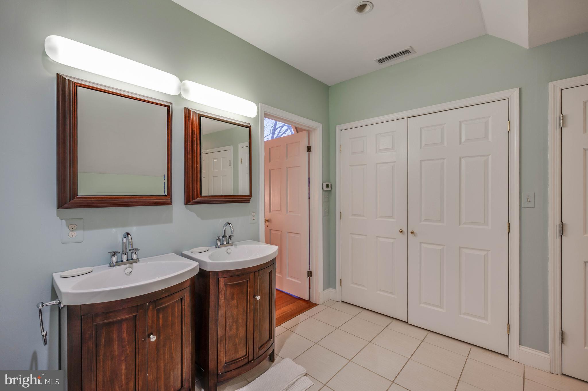 3223 Mt Zion Road Upperco, MD 21155 - Photo 52 of 65 a bathroom with a sink and a mirror