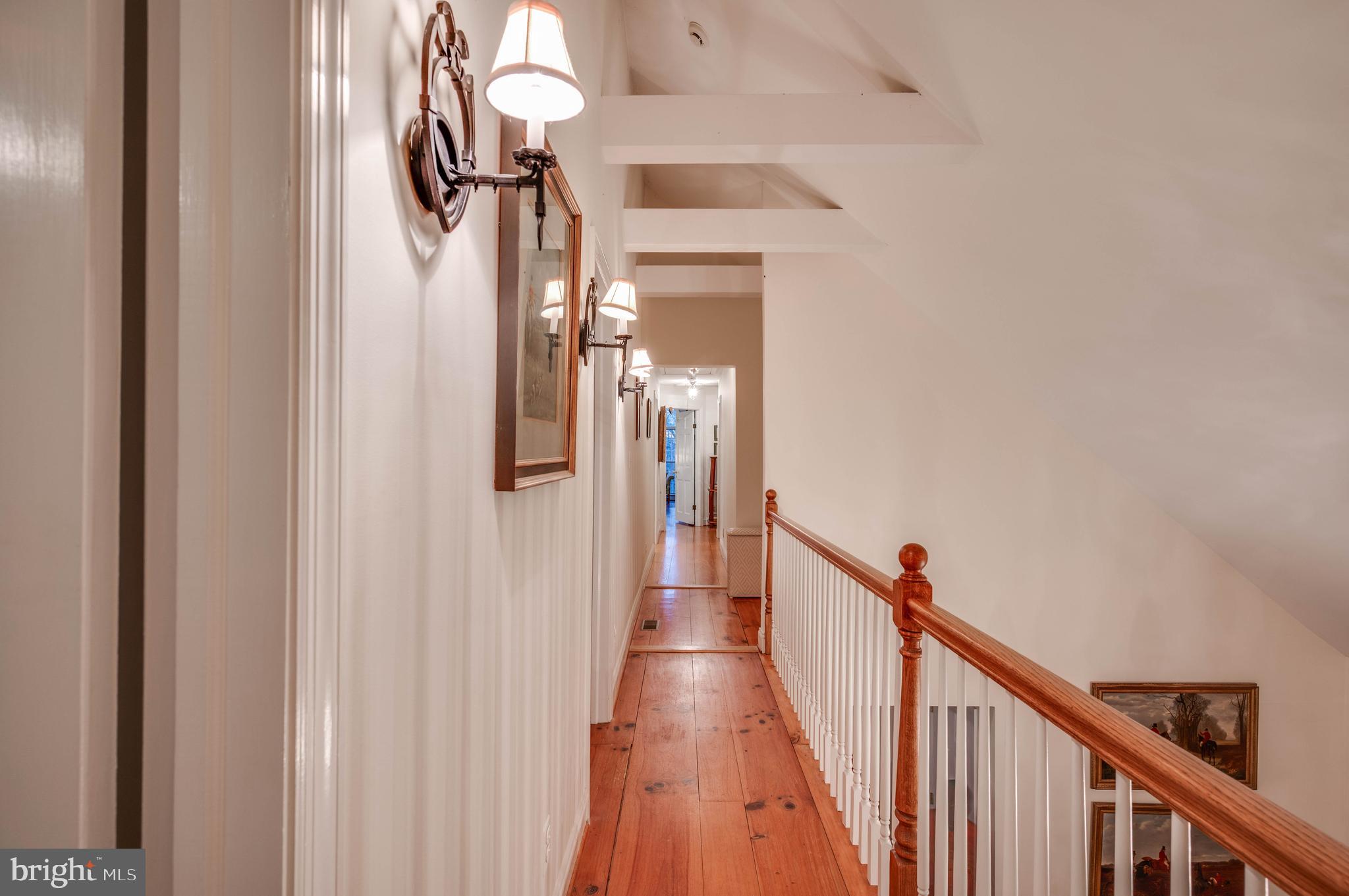 3223 Mt Zion Road Upperco, MD 21155 - Photo 58 of 65 a view of a hallway with wooden floor and entryway
