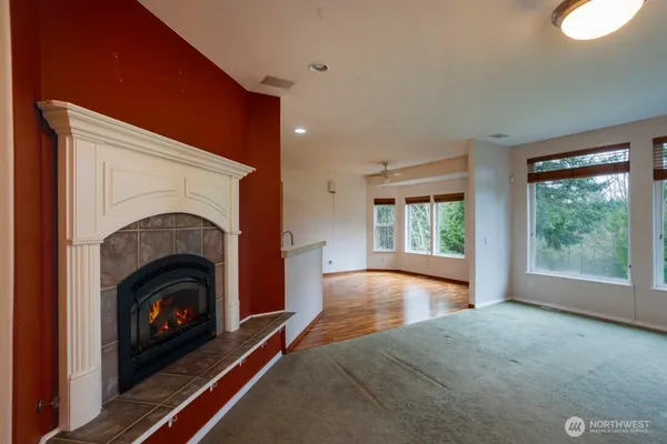 a view of livingroom with furniture and a fireplace