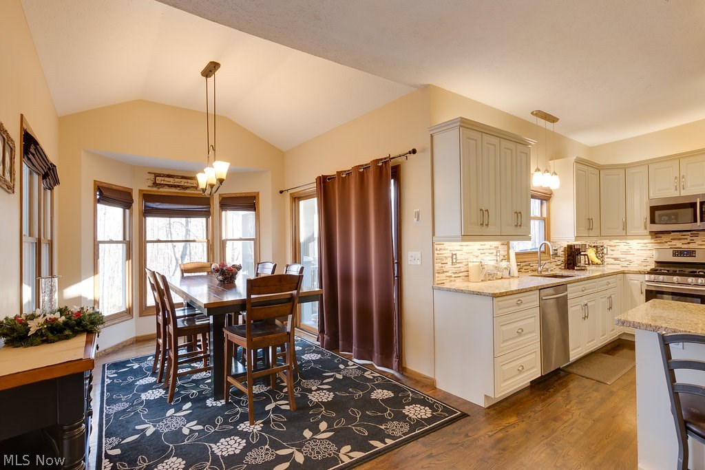 11655 Kile Road Chardon, OH 44024 - Photo 11 of 35 Kitchen with sliding glass door to back deck