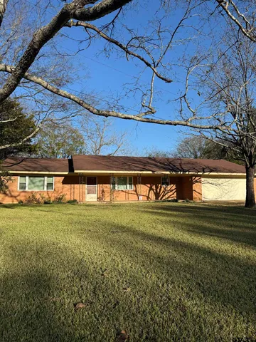 a view of a yard with an outdoor space
