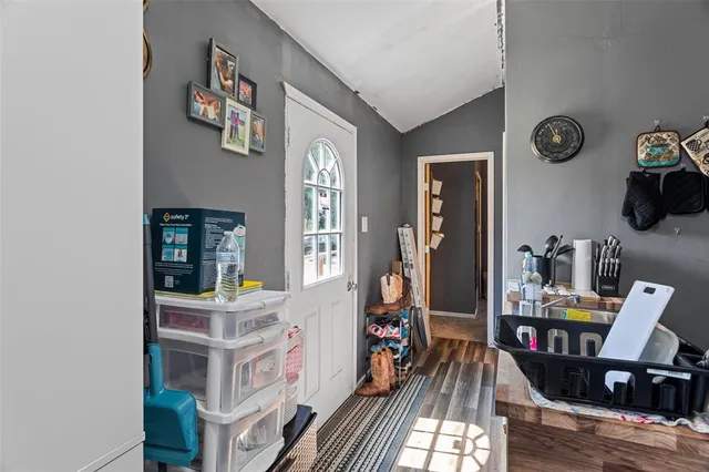 a view of a workspace with furniture and toys