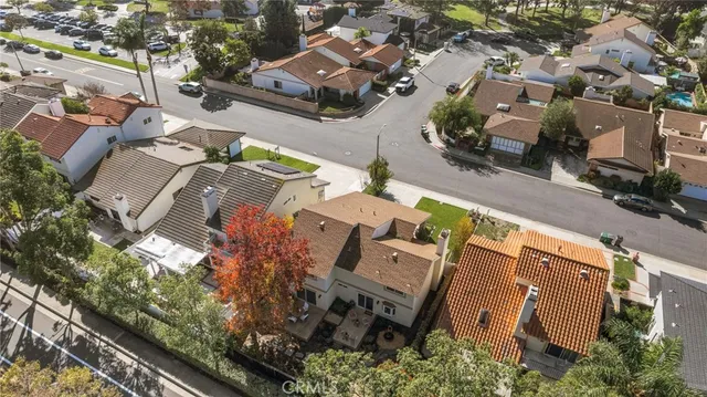 an aerial view of a house with a garden
