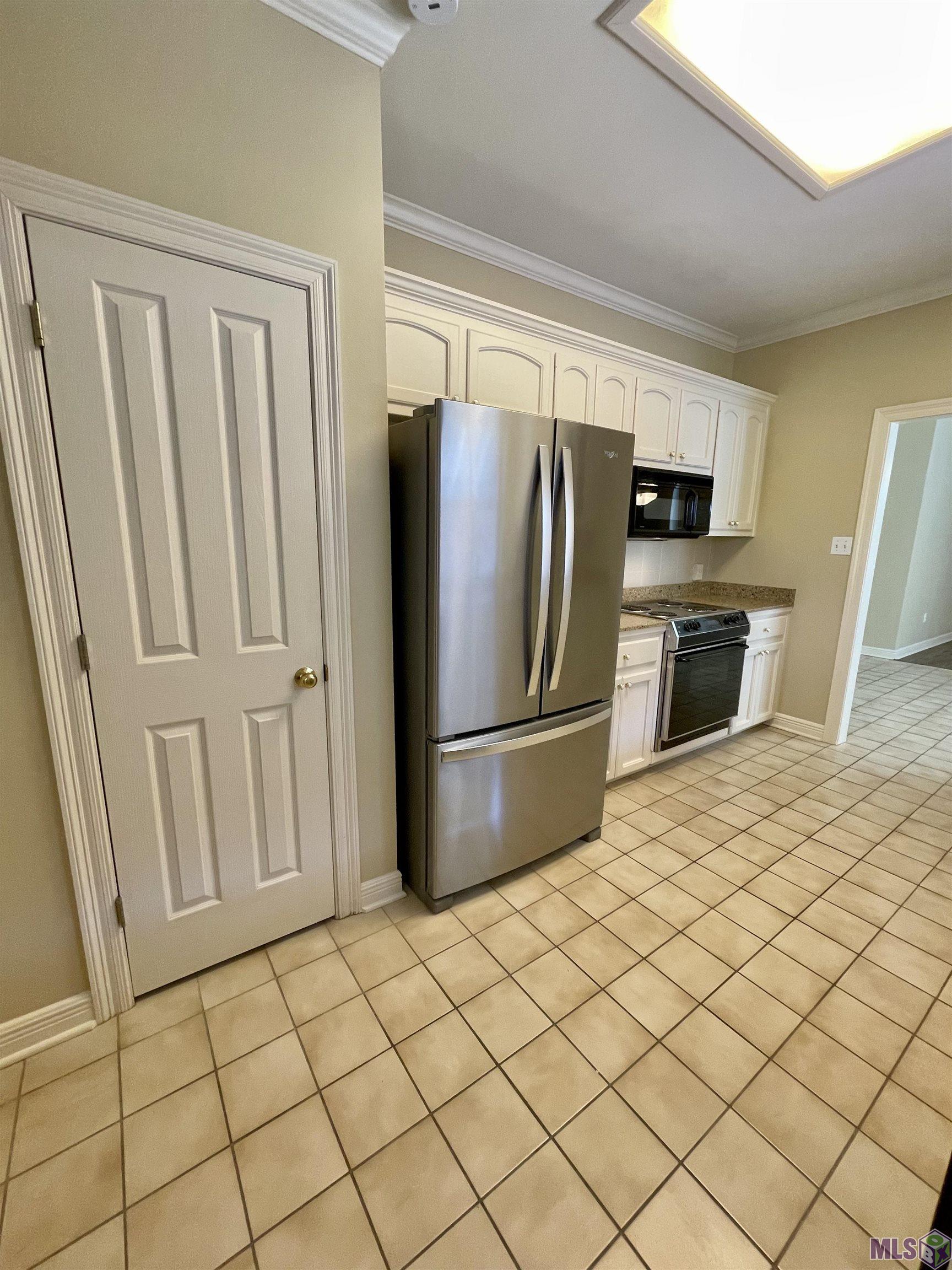 1741 Obrien Drive St. George, LA 70810 - Photo 13 of 27 Pantry and SS Whirlpool Fridge with Icemaker