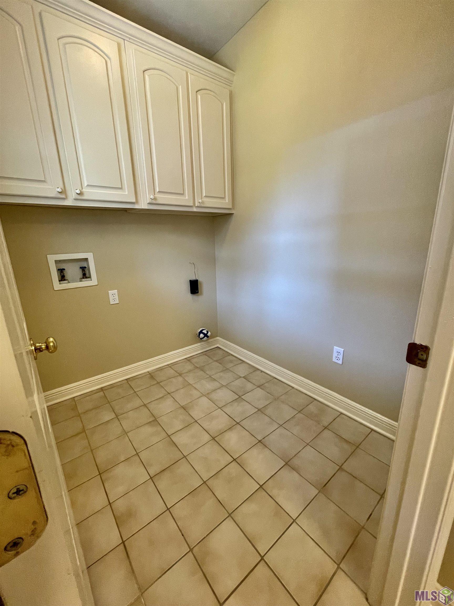 1741 Obrien Drive St. George, LA 70810 - Photo 15 of 27 Laundry with Cabinets also has Built in Shelving