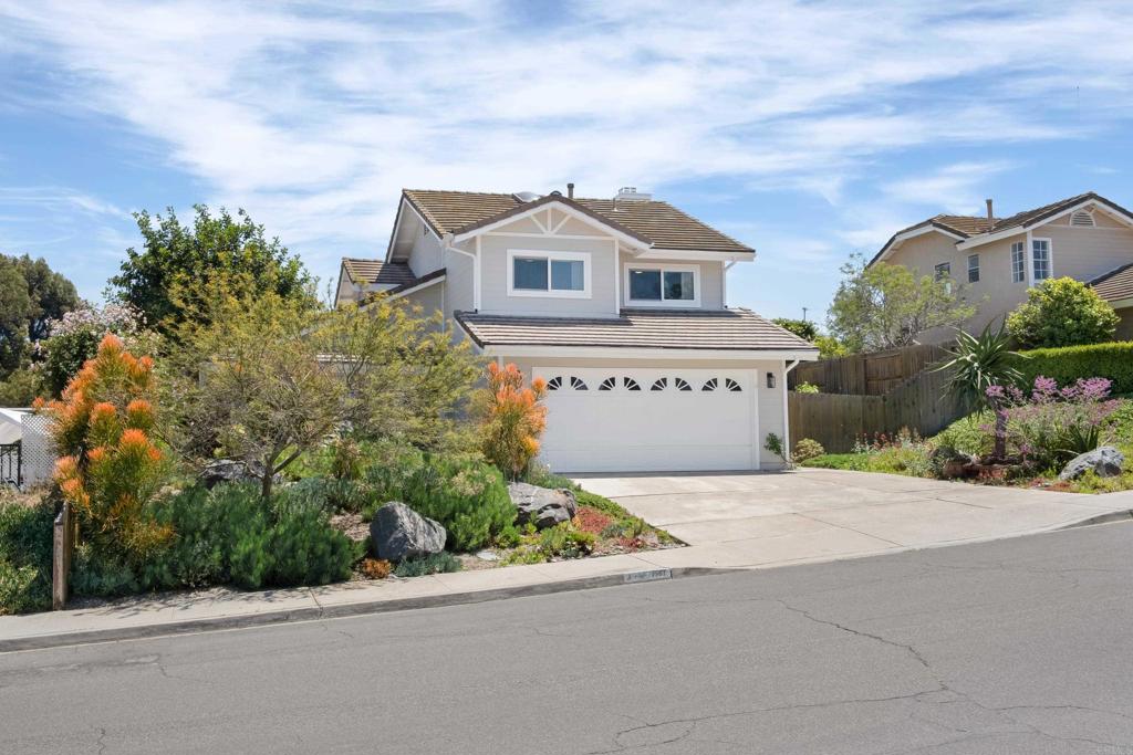 1361 Hodges Road Oceanside, CA 92056 - Photo 1 of 39 a view of a house with a street