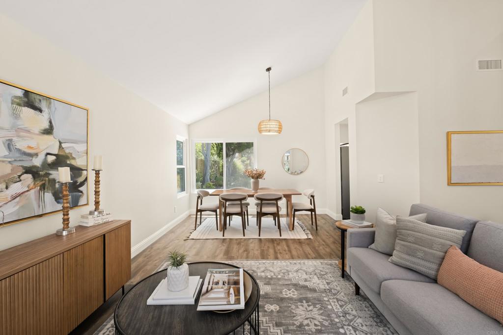 1361 Hodges Road Oceanside, CA 92056 - Photo 5 of 39 a living room with furniture and a large window