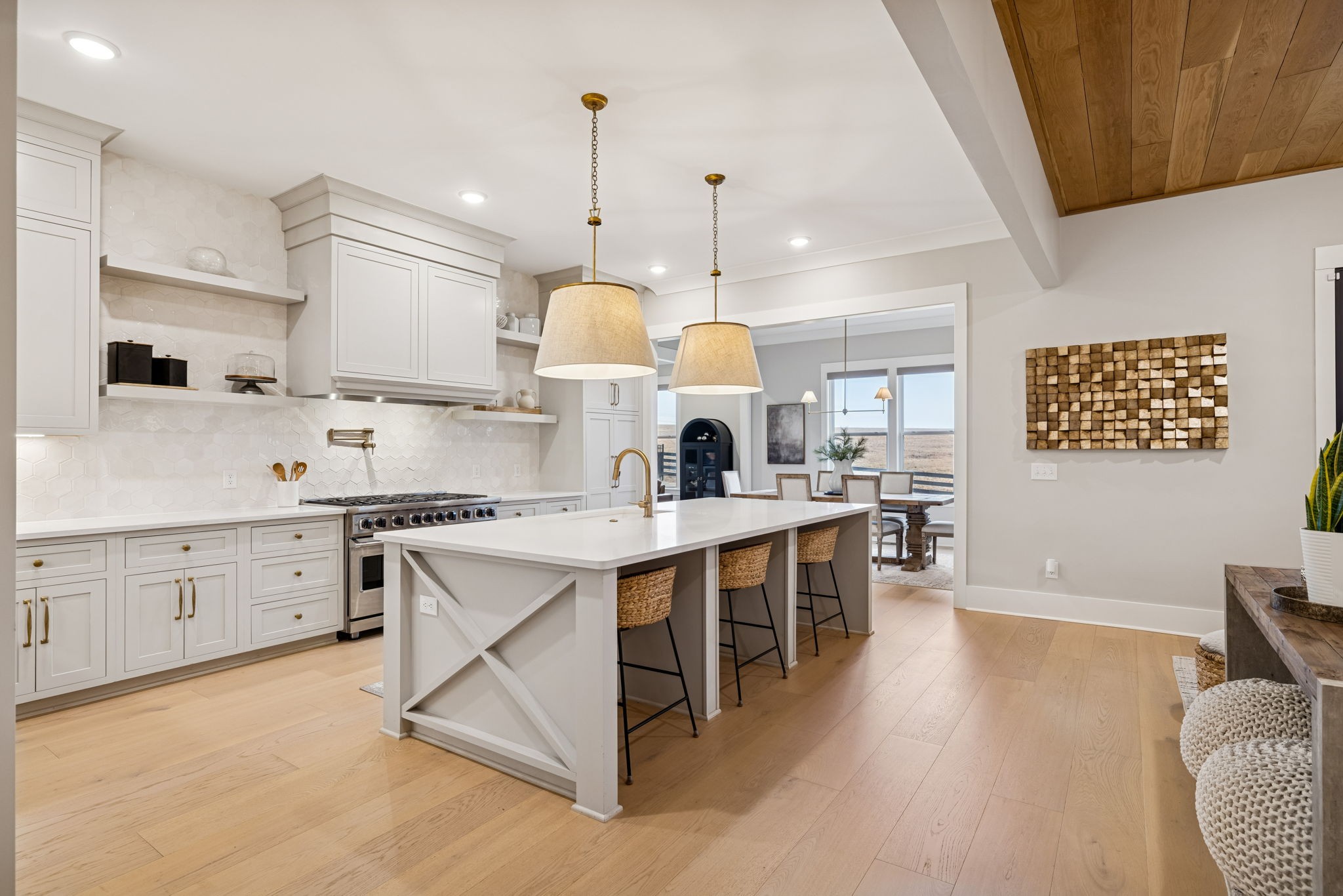 137 Alfred Ladd Road Franklin, TN 37064 - Photo 28 of 99 a kitchen with white cabinets stove and white appliances