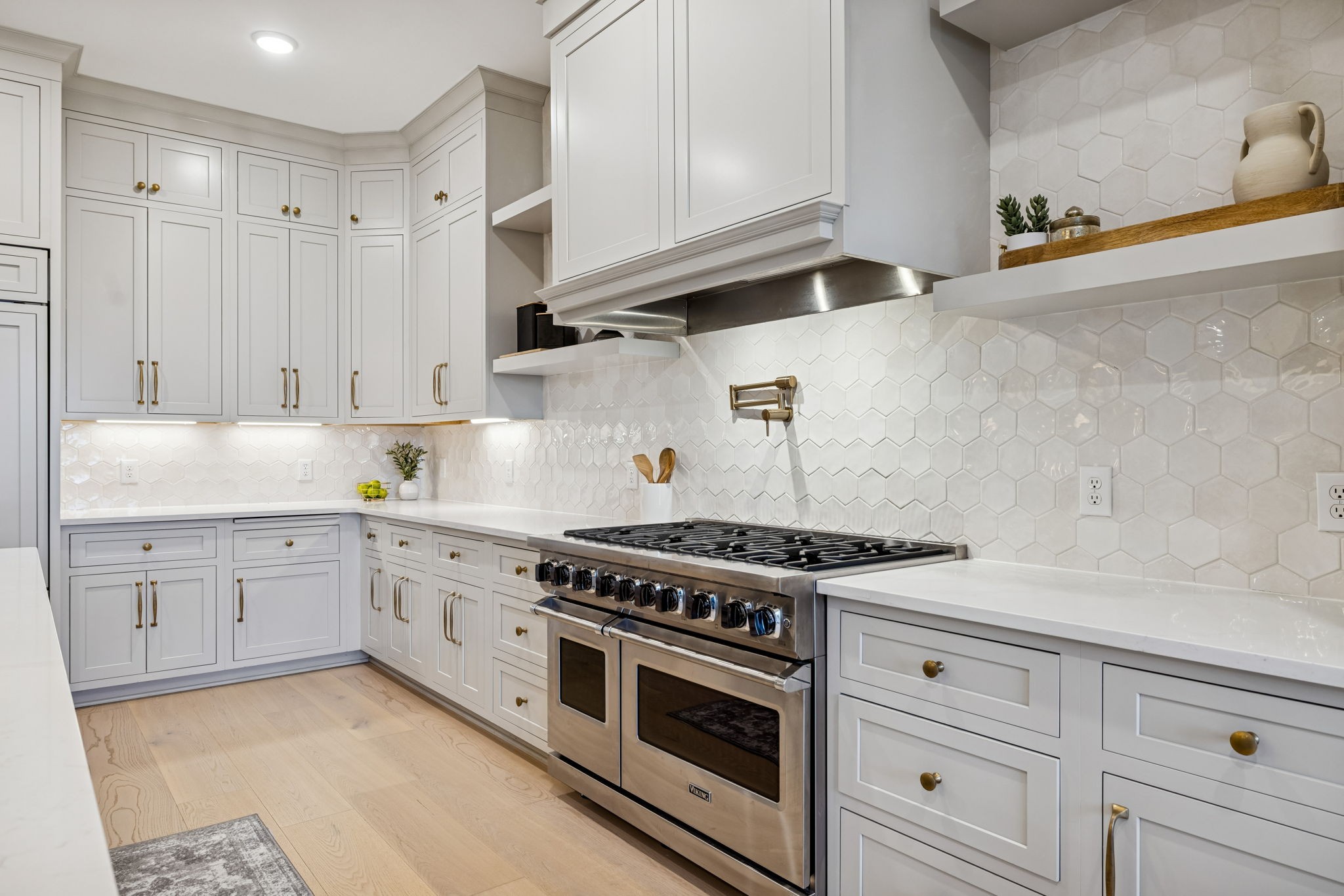 137 Alfred Ladd Road Franklin, TN 37064 - Photo 34 of 99 a kitchen with granite countertop white cabinets and white stove