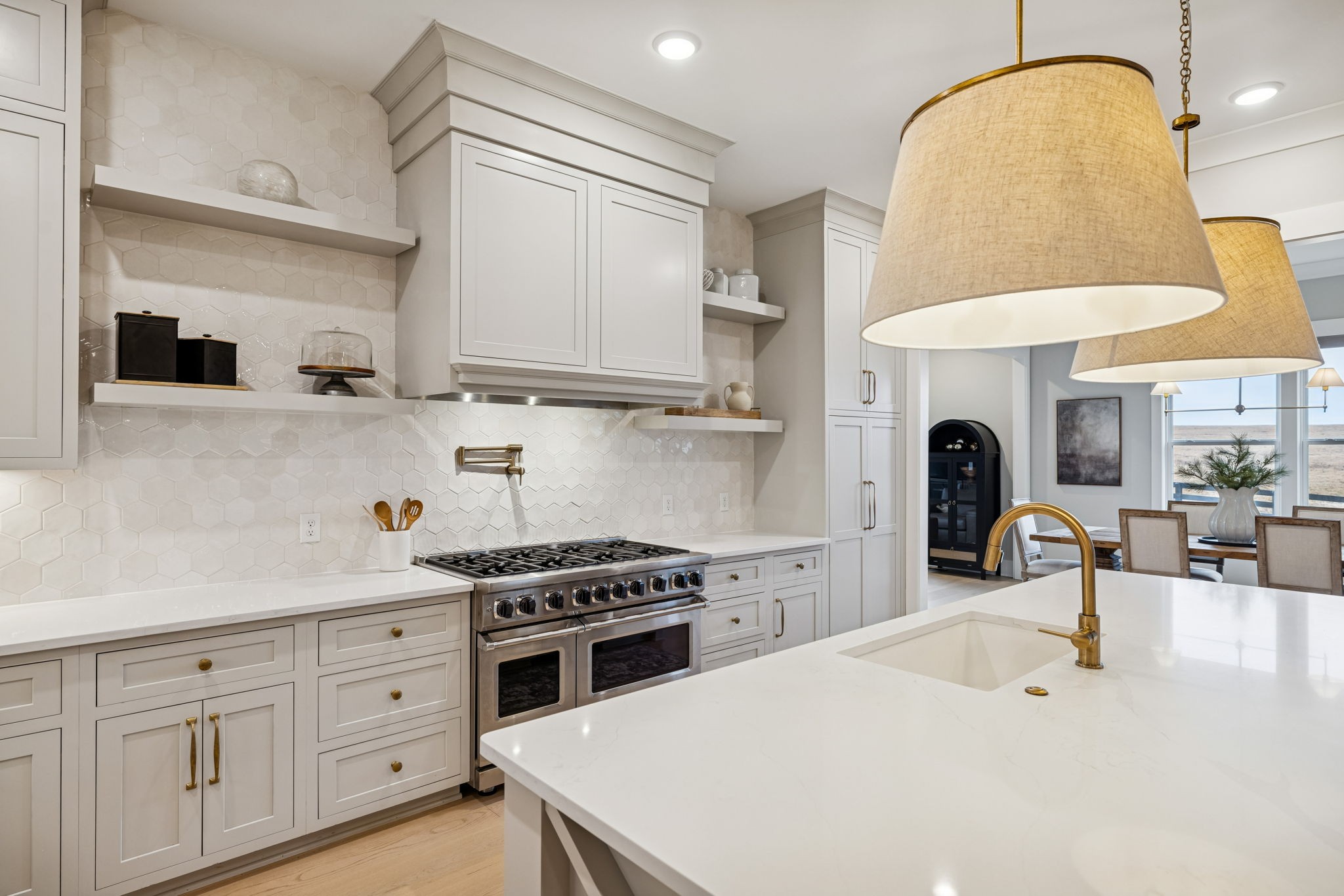 137 Alfred Ladd Road Franklin, TN 37064 - Photo 36 of 99 a kitchen with stainless steel appliances kitchen island a white counter space and a sink