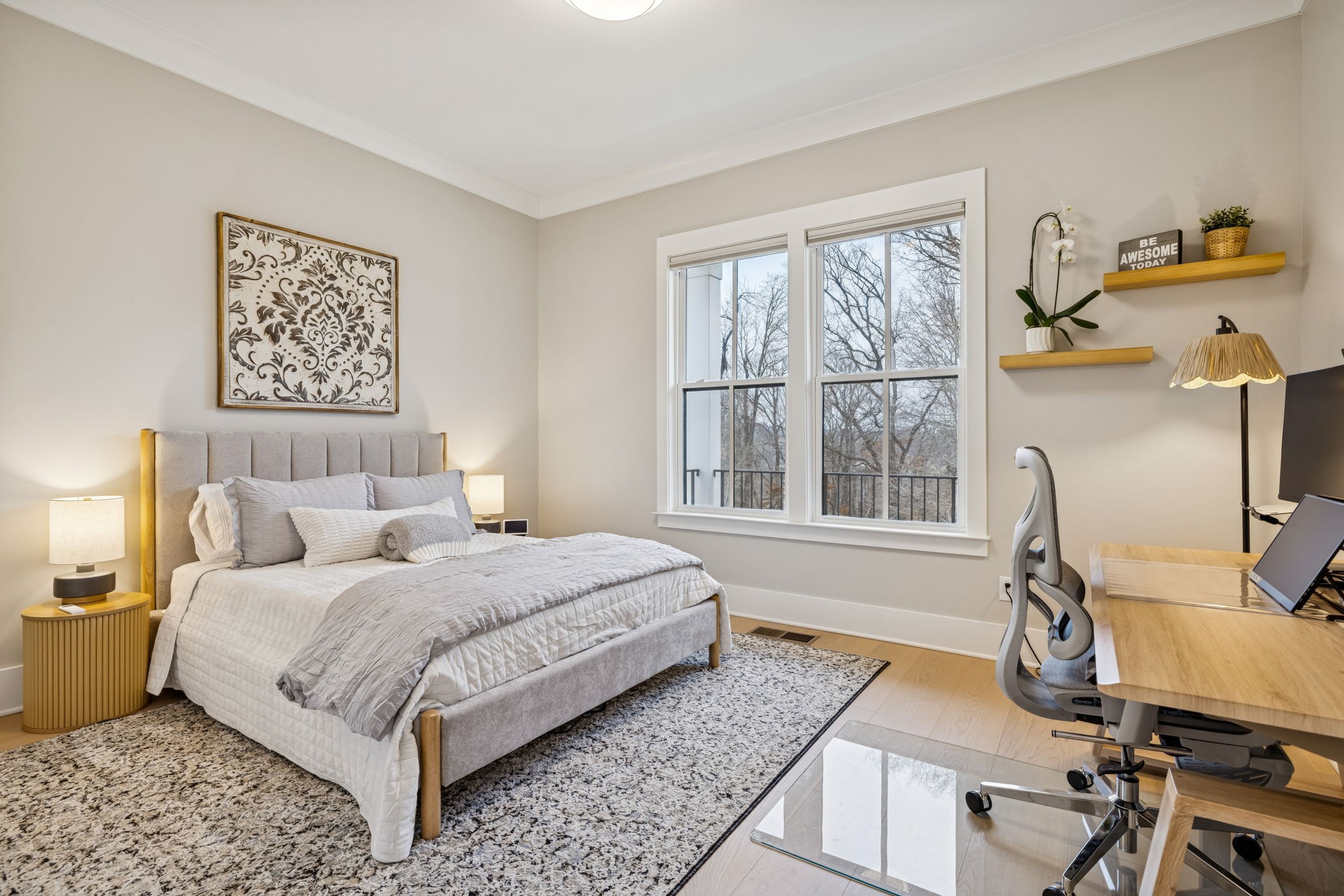 137 Alfred Ladd Road Franklin, TN 37064 - Photo 53 of 99 a bedroom with a bed a table and chair