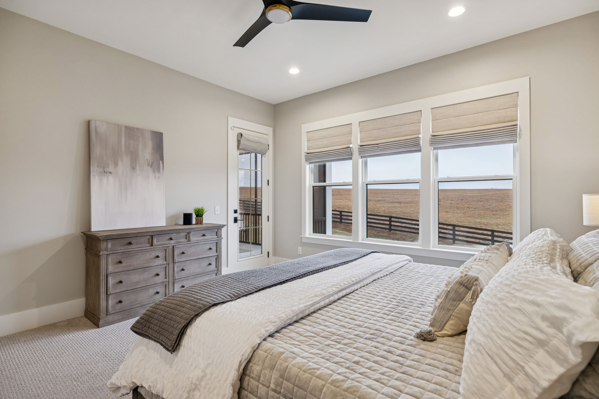 137 Alfred Ladd Road Franklin, TN 37064 - Photo 58 of 99 a bedroom with a large bed and a window