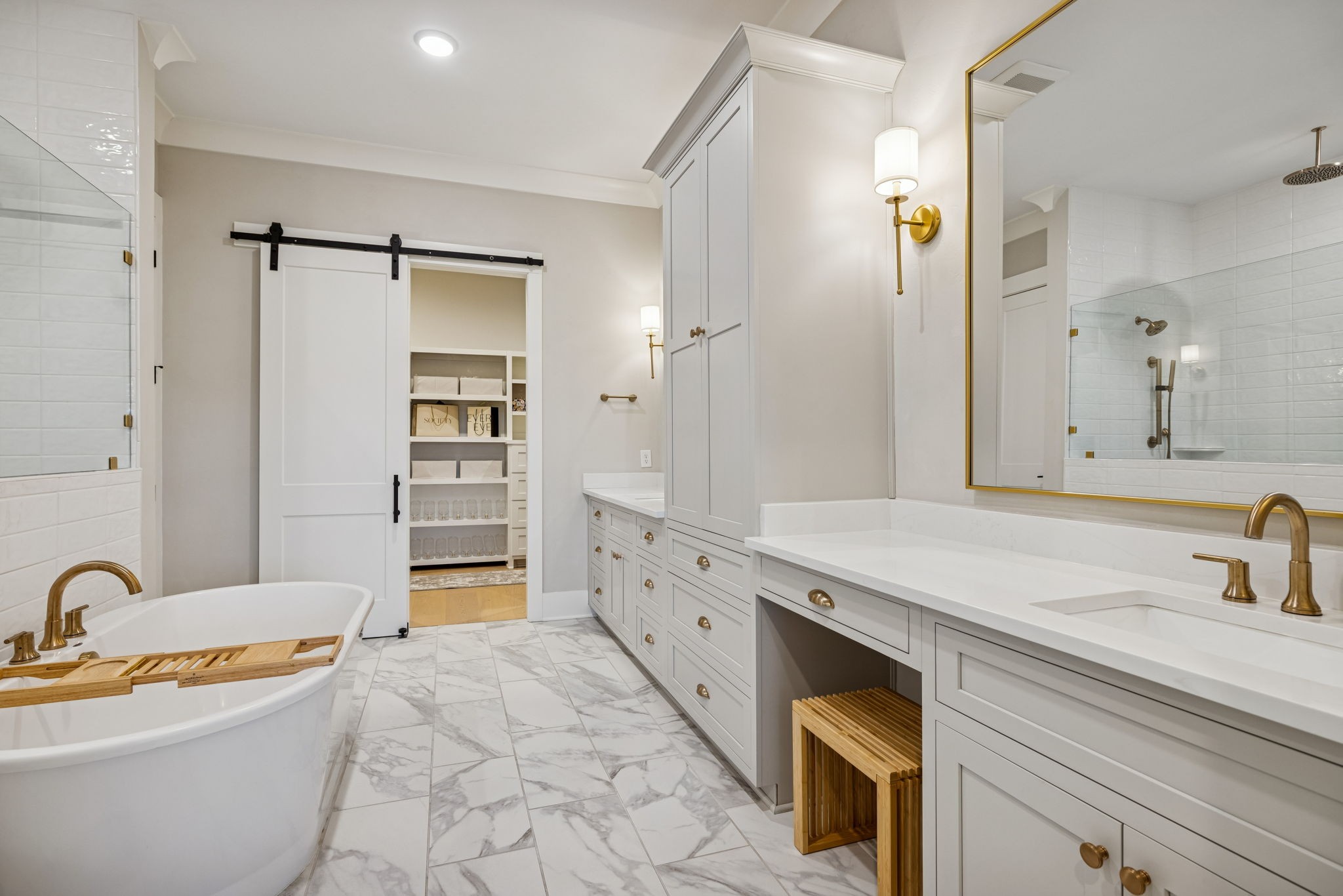 137 Alfred Ladd Road Franklin, TN 37064 - Photo 61 of 99 a spacious bathroom with a double vanity sink a mirror a bathtub and a shower