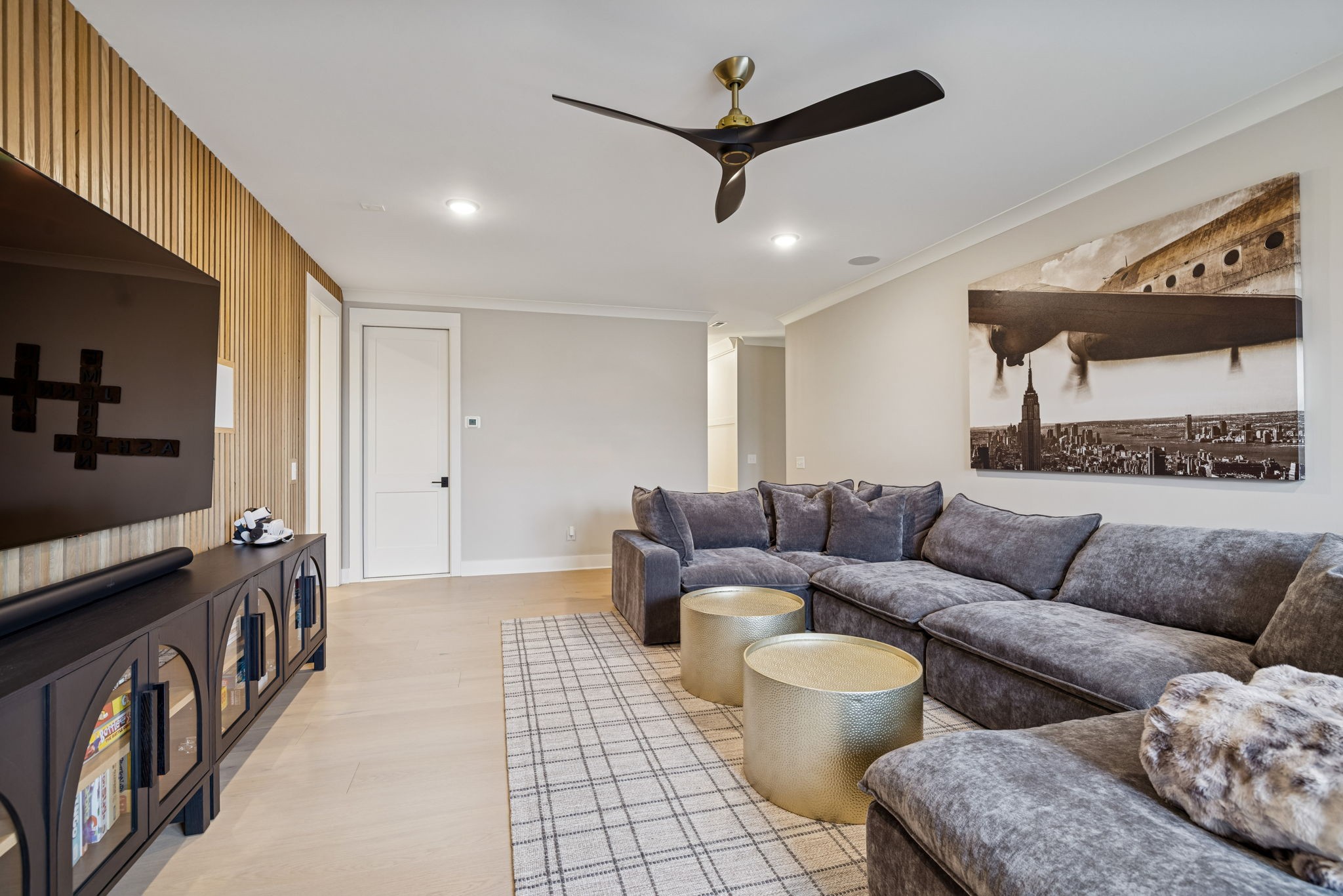 137 Alfred Ladd Road Franklin, TN 37064 - Photo 73 of 99 a living room with furniture and a flat screen tv