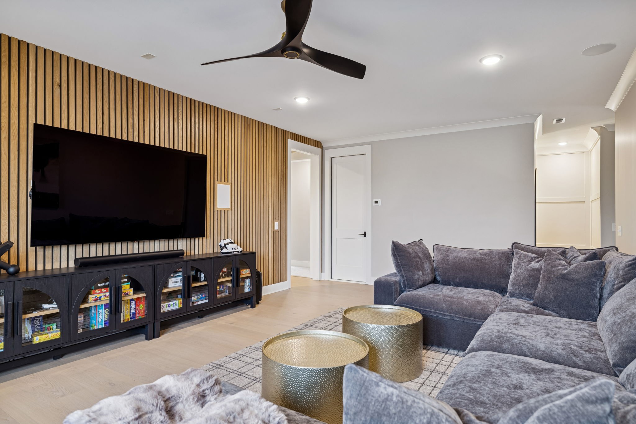 137 Alfred Ladd Road Franklin, TN 37064 - Photo 74 of 99 a living room with furniture and a flat screen tv