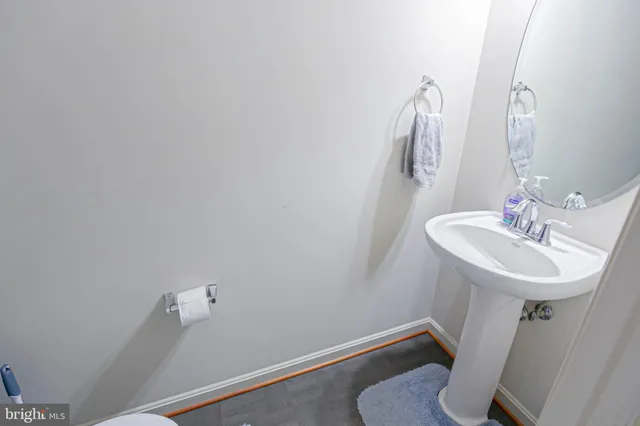 a bathroom with a sink and a toilet