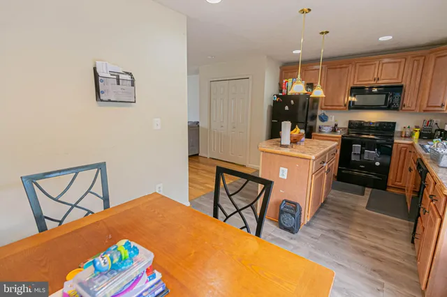 a view of a deck with wooden floor and fence