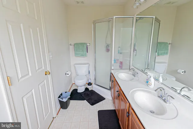 a view of a street with houses and a street view