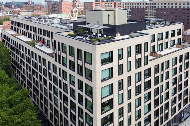 a view of a building with a yard