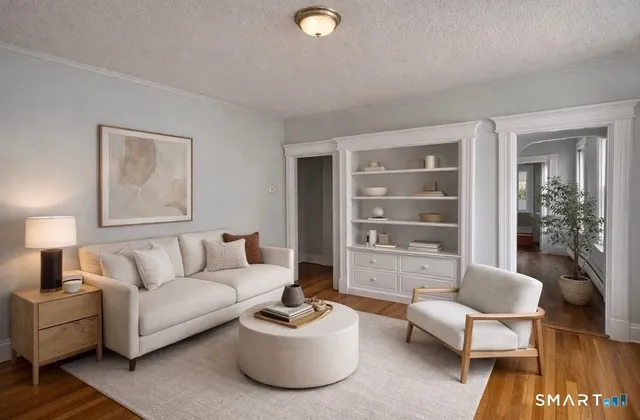 a living room with furniture and a window