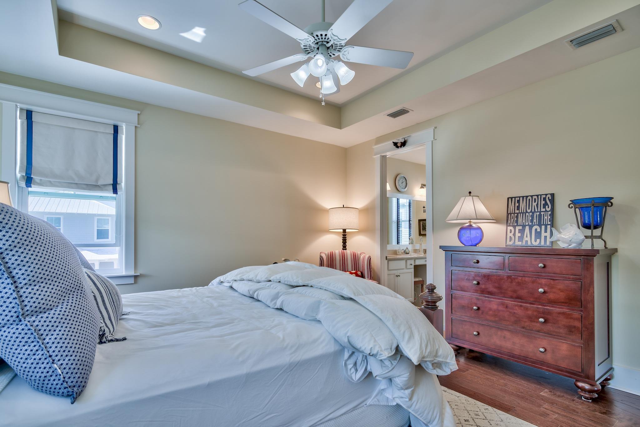 664 Flatwoods Forest Loop Santa Rosa Beach, FL 32459 - Photo 21 of 33 a bedroom with a bed and ceiling fan