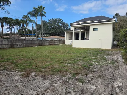a view of house with outdoor space