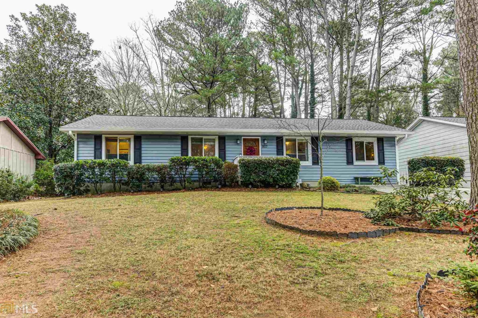 857 Cinderella Court, Unit 4 Decatur, GA 30033 - Photo 1 of 1 a front view of a house with a yard