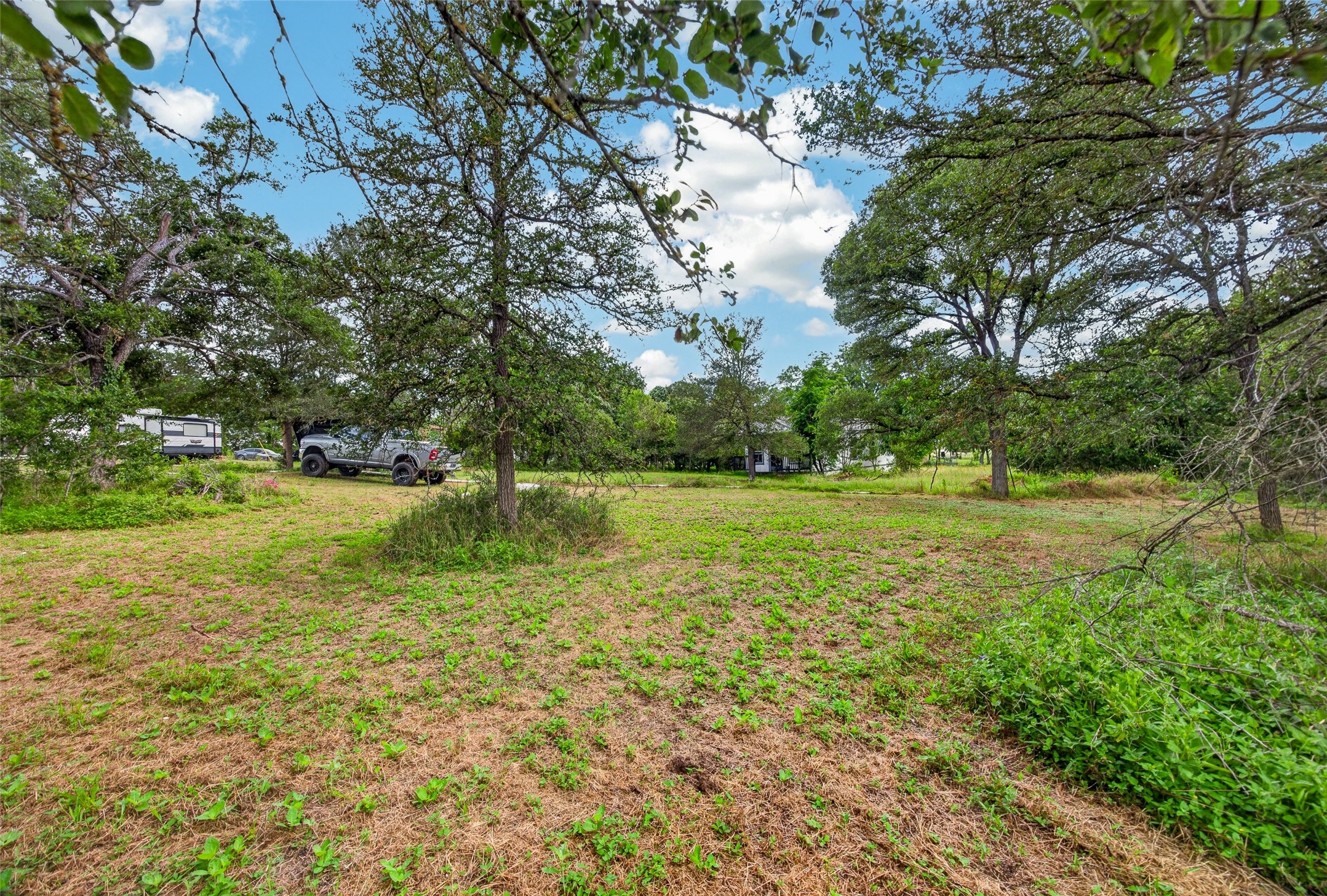 266 Beaver Road Elgin, TX 78621 - Photo 34 of 40 Ready-to-build area with ample space for a cabin, tiny home, RV site, or investment expansion opportunities.