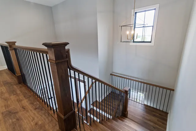 a view of a balcony with wooden floor