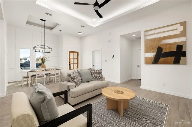 a living room with furniture and a table