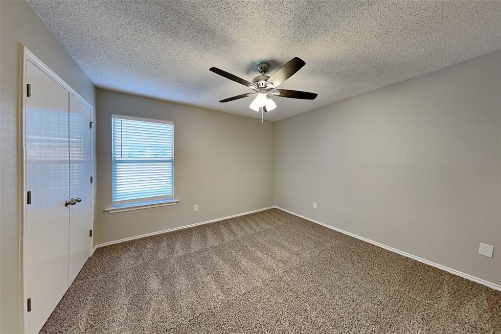 1200 Rambling Brook Trail Denton, TX 76210 - Photo 12 of 21 a view of an empty room with a window